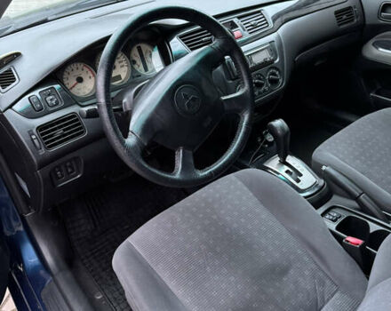 Синій Міцубісі Lancer, об'ємом двигуна 1.6 л та пробігом 200 тис. км за 5000 $, фото 8 на Automoto.ua