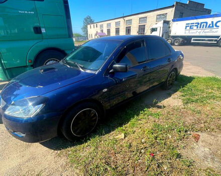 Синій Міцубісі Lancer, об'ємом двигуна 1.6 л та пробігом 239 тис. км за 3800 $, фото 8 на Automoto.ua