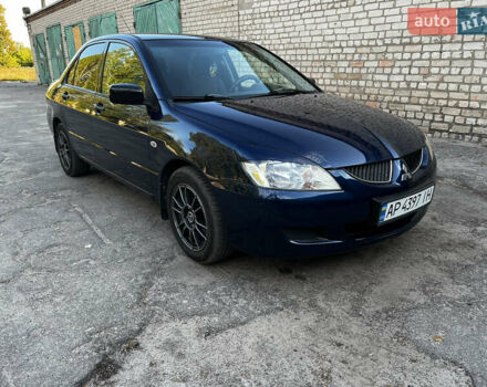 Синій Міцубісі Lancer, об'ємом двигуна 1.58 л та пробігом 324 тис. км за 4150 $, фото 8 на Automoto.ua