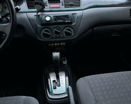 Синій Міцубісі Lancer, об'ємом двигуна 1.6 л та пробігом 200 тис. км за 5000 $, фото 9 на Automoto.ua