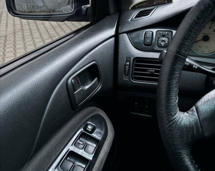 Синій Міцубісі Lancer, об'ємом двигуна 1.6 л та пробігом 200 тис. км за 5000 $, фото 11 на Automoto.ua