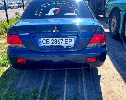 Синій Міцубісі Lancer, об'ємом двигуна 1.6 л та пробігом 239 тис. км за 3800 $, фото 1 на Automoto.ua