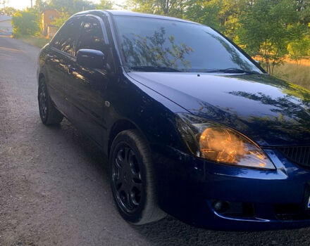 Синий Мицубиси Лансер, объемом двигателя 1.6 л и пробегом 295 тыс. км за 4550 $, фото 4 на Automoto.ua