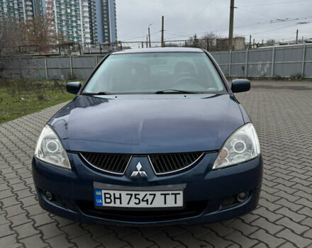 Синій Міцубісі Lancer, об'ємом двигуна 1.6 л та пробігом 200 тис. км за 5000 $, фото 1 на Automoto.ua