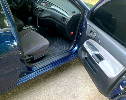 Синий Мицубиси Лансер, объемом двигателя 1.6 л и пробегом 295 тыс. км за 4550 $, фото 11 на Automoto.ua