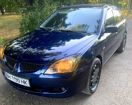 Синий Мицубиси Лансер, объемом двигателя 1.6 л и пробегом 295 тыс. км за 4550 $, фото 3 на Automoto.ua