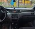 Синій Міцубісі Lancer, об'ємом двигуна 1.3 л та пробігом 260 тис. км за 3800 $, фото 10 на Automoto.ua