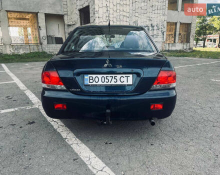 Синий Мицубиси Лансер, объемом двигателя 1.58 л и пробегом 210 тыс. км за 3200 $, фото 6 на Automoto.ua