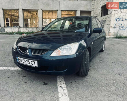 Синий Мицубиси Лансер, объемом двигателя 1.58 л и пробегом 210 тыс. км за 3200 $, фото 2 на Automoto.ua