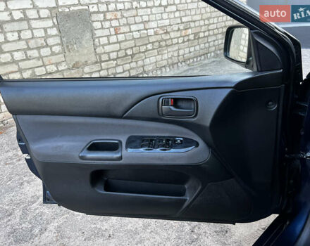 Синій Міцубісі Lancer, об'ємом двигуна 1.58 л та пробігом 324 тис. км за 4150 $, фото 9 на Automoto.ua