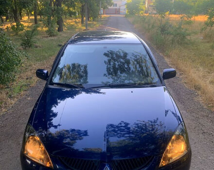 Синий Мицубиси Лансер, объемом двигателя 1.6 л и пробегом 295 тыс. км за 4550 $, фото 2 на Automoto.ua