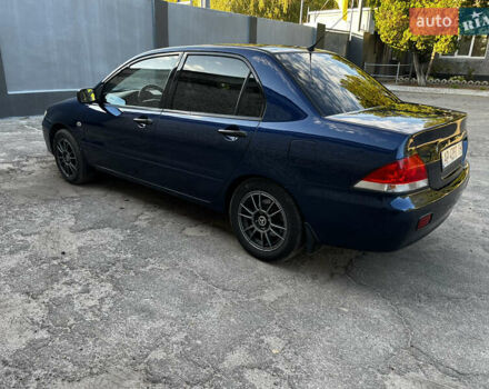 Синій Міцубісі Lancer, об'ємом двигуна 1.58 л та пробігом 324 тис. км за 4150 $, фото 2 на Automoto.ua