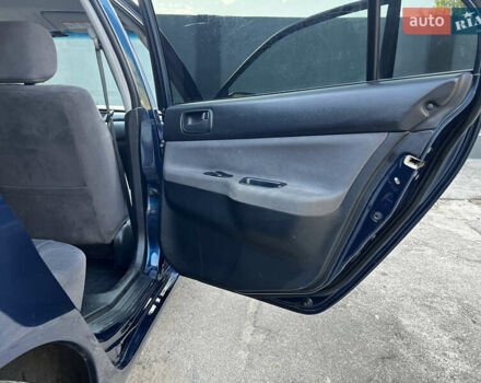 Синій Міцубісі Lancer, об'ємом двигуна 1.58 л та пробігом 324 тис. км за 4150 $, фото 19 на Automoto.ua