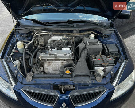 Синій Міцубісі Lancer, об'ємом двигуна 1.58 л та пробігом 324 тис. км за 4150 $, фото 23 на Automoto.ua