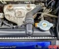 Синий Мицубиси Лансер, объемом двигателя 1.3 л и пробегом 260 тыс. км за 4000 $, фото 4 на Automoto.ua