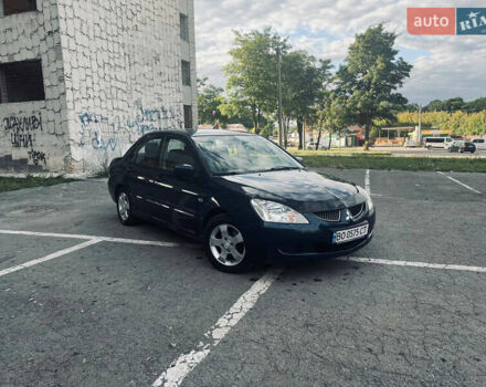Синий Мицубиси Лансер, объемом двигателя 1.58 л и пробегом 210 тыс. км за 3200 $, фото 4 на Automoto.ua