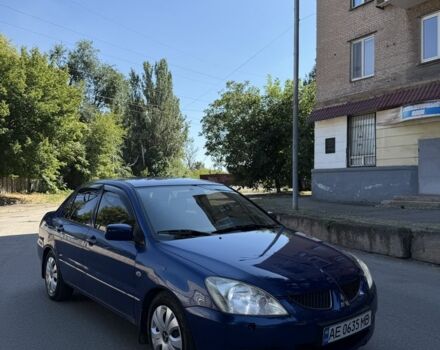 Синій Міцубісі Lancer, об'ємом двигуна 1.3 л та пробігом 198 тис. км за 3750 $, фото 6 на Automoto.ua