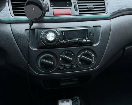 Синій Міцубісі Lancer, об'ємом двигуна 1.6 л та пробігом 200 тис. км за 5000 $, фото 10 на Automoto.ua