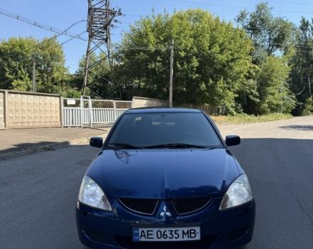 Синій Міцубісі Lancer, об'ємом двигуна 1.3 л та пробігом 198 тис. км за 3750 $, фото 7 на Automoto.ua