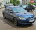 Синій Міцубісі Lancer, об'ємом двигуна 1.58 л та пробігом 250 тис. км за 1950 $, фото 1 на Automoto.ua