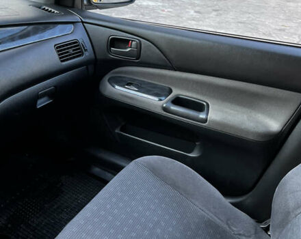 Синій Міцубісі Lancer, об'ємом двигуна 1.58 л та пробігом 324 тис. км за 4150 $, фото 15 на Automoto.ua