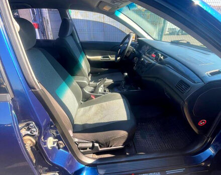 Синій Міцубісі Lancer, об'ємом двигуна 1.6 л та пробігом 239 тис. км за 3800 $, фото 7 на Automoto.ua