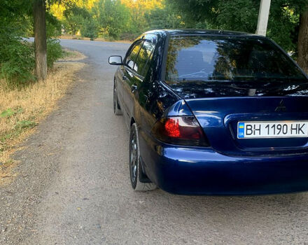 Синий Мицубиси Лансер, объемом двигателя 1.6 л и пробегом 295 тыс. км за 4550 $, фото 7 на Automoto.ua