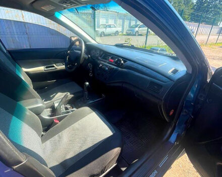 Синій Міцубісі Lancer, об'ємом двигуна 1.6 л та пробігом 239 тис. км за 3800 $, фото 9 на Automoto.ua