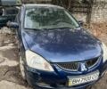 Синій Міцубісі Lancer, об'ємом двигуна 1.6 л та пробігом 200 тис. км за 1199 $, фото 1 на Automoto.ua