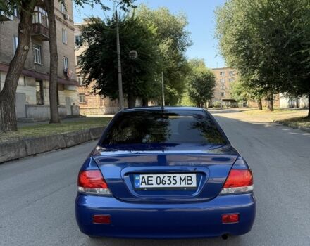 Синій Міцубісі Lancer, об'ємом двигуна 1.3 л та пробігом 198 тис. км за 3750 $, фото 3 на Automoto.ua