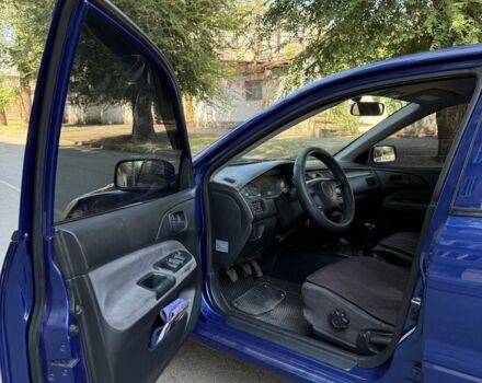 Синій Міцубісі Lancer, об'ємом двигуна 1.3 л та пробігом 198 тис. км за 3750 $, фото 8 на Automoto.ua