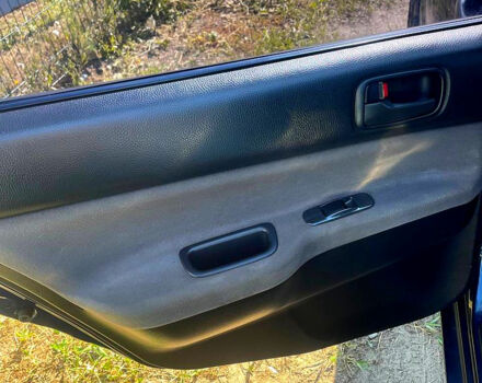Синій Міцубісі Lancer, об'ємом двигуна 1.6 л та пробігом 239 тис. км за 3800 $, фото 4 на Automoto.ua