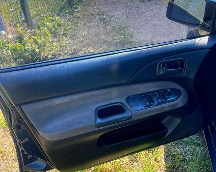 Синій Міцубісі Lancer, об'ємом двигуна 1.6 л та пробігом 239 тис. км за 3800 $, фото 2 на Automoto.ua