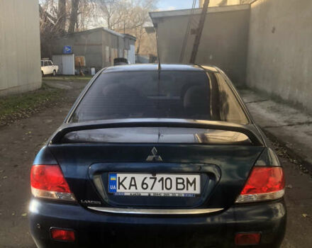Синій Міцубісі Lancer, об'ємом двигуна 1.58 л та пробігом 346 тис. км за 4500 $, фото 2 на Automoto.ua