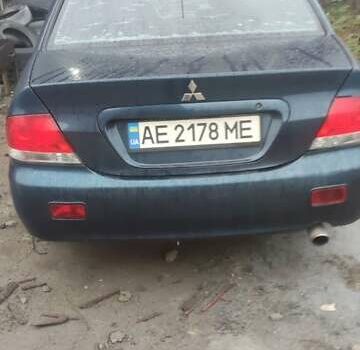 Синий Мицубиси Лансер, объемом двигателя 1.58 л и пробегом 358 тыс. км за 3500 $, фото 6 на Automoto.ua