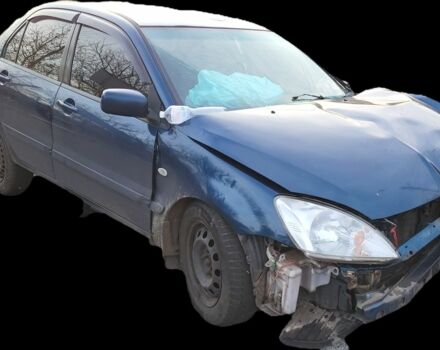 Синий Мицубиси Лансер, объемом двигателя 1 л и пробегом 380 тыс. км за 1421 $, фото 1 на Automoto.ua