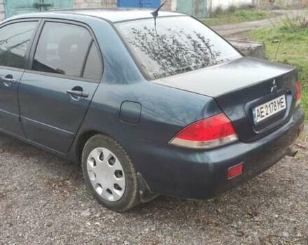 Синий Мицубиси Лансер, объемом двигателя 1.58 л и пробегом 358 тыс. км за 3500 $, фото 9 на Automoto.ua