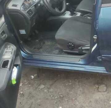 Синий Мицубиси Лансер, объемом двигателя 1.58 л и пробегом 358 тыс. км за 3500 $, фото 4 на Automoto.ua