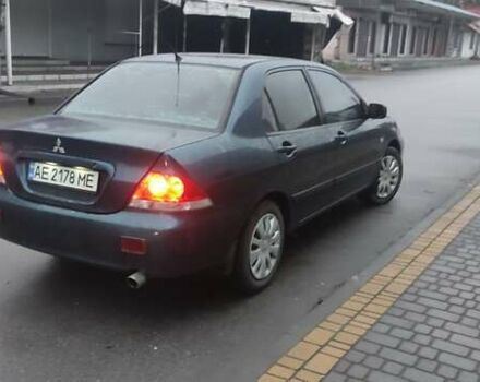 Синий Мицубиси Лансер, объемом двигателя 1.58 л и пробегом 358 тыс. км за 3500 $, фото 1 на Automoto.ua