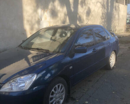 Синій Міцубісі Lancer, об'ємом двигуна 1.58 л та пробігом 346 тис. км за 4500 $, фото 1 на Automoto.ua