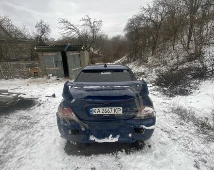 Синий Мицубиси Лансер, объемом двигателя 2 л и пробегом 320 тыс. км за 2700 $, фото 7 на Automoto.ua