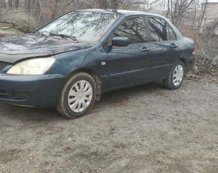 Синий Мицубиси Лансер, объемом двигателя 1.58 л и пробегом 358 тыс. км за 3500 $, фото 8 на Automoto.ua