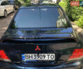Синій Міцубісі Lancer, об'ємом двигуна 1.6 л та пробігом 235 тис. км за 3500 $, фото 4 на Automoto.ua