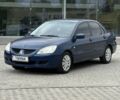 Синий Мицубиси Лансер, объемом двигателя 1.6 л и пробегом 252 тыс. км за 3450 $, фото 1 на Automoto.ua