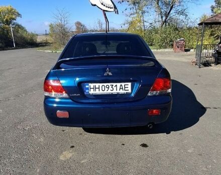 Синій Міцубісі Lancer, об'ємом двигуна 1.6 л та пробігом 267 тис. км за 3700 $, фото 5 на Automoto.ua