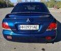 Синий Мицубиси Лансер, объемом двигателя 1.6 л и пробегом 268 тыс. км за 5000 $, фото 13 на Automoto.ua