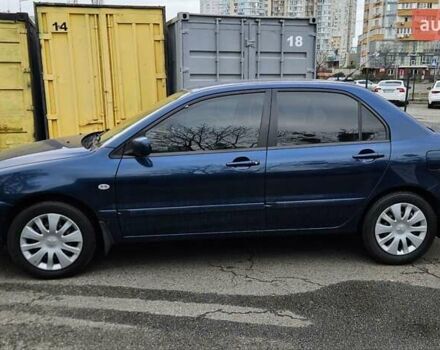 Синий Мицубиси Лансер, объемом двигателя 1.62 л и пробегом 114 тыс. км за 5200 $, фото 3 на Automoto.ua