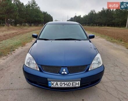 Синий Мицубиси Лансер, объемом двигателя 1.6 л и пробегом 222 тыс. км за 4599 $, фото 9 на Automoto.ua