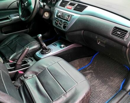 Синий Мицубиси Лансер, объемом двигателя 1.6 л и пробегом 300 тыс. км за 3700 $, фото 5 на Automoto.ua