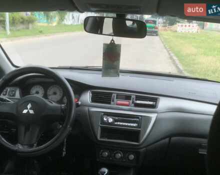 Мицубиси Лансер 2006 в Львове на Automoto.ua Синий Мицубиси Лансер, объемом двигателя 1.58 л и пробегом 420 тыс. км за 2900 $, фото 7 на Automoto.ua